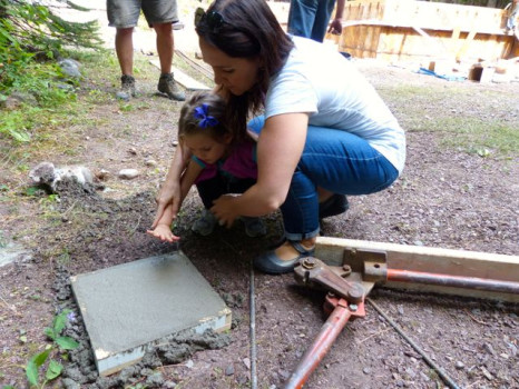 Carly And Luna, Making A Handprint To Incorporate Into The Foundation Slab